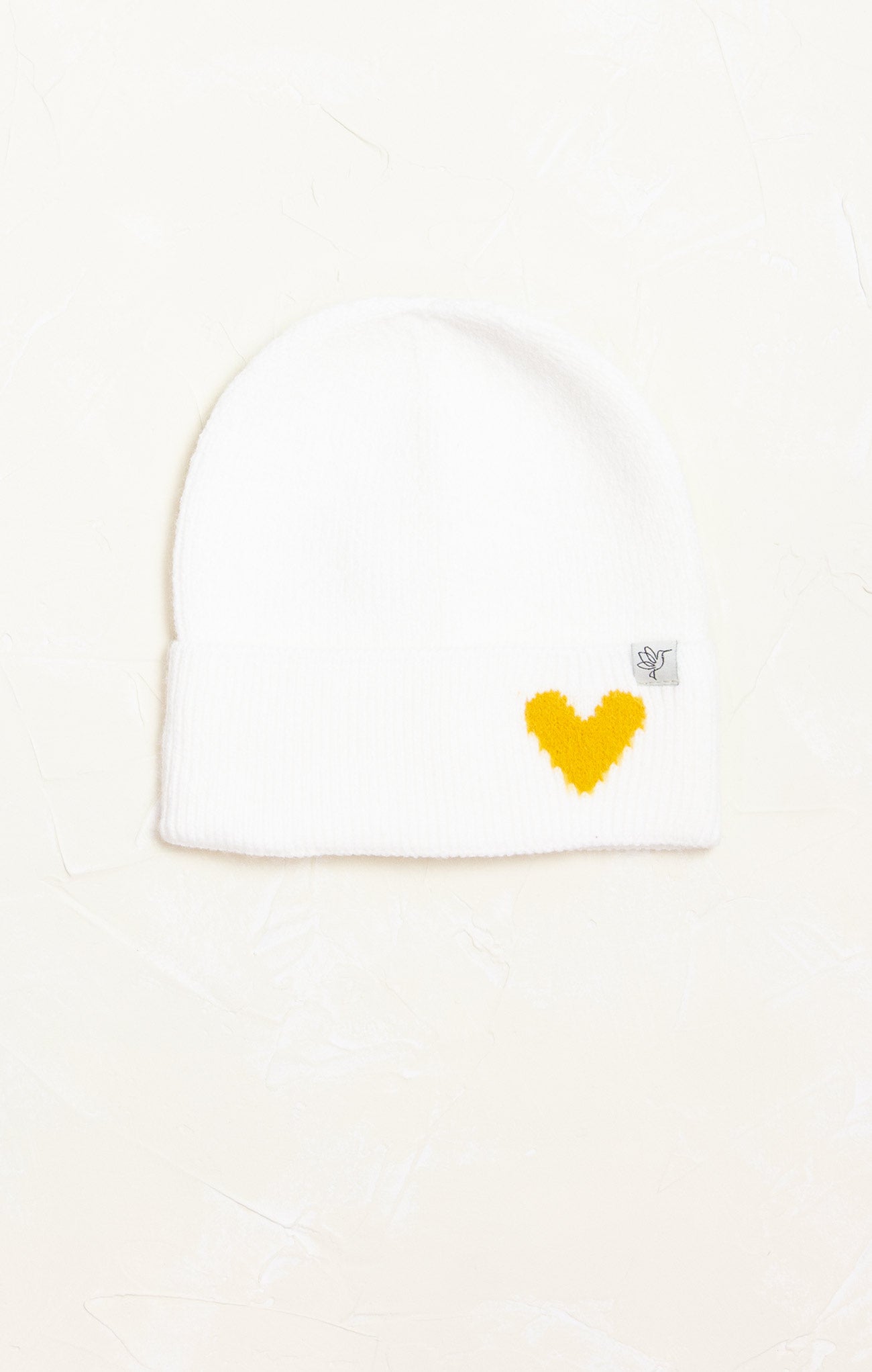 Camilla Cozy Heart Winter Beanie, cover photo, ivory, heart detail, cuffed rim